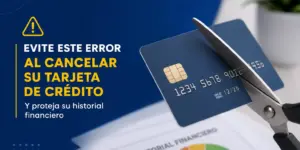 tesoura cortando cartão de crédito azul com aviso em fundo