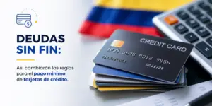 Cartões de crédito e bandeira colombiana em uma mesa com gráfico