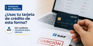 Mão com cartão de crédito frente ao laptop mostrando FINANÇAS 2026