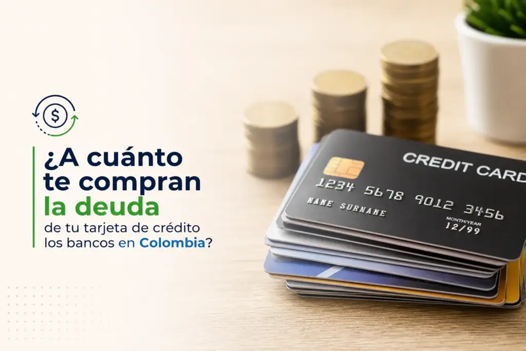Cartões de crédito e moedas em fundo de madeira clara 2026